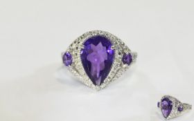 Pear Cut Amethyst Ring, a pear cut purpl