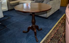 Tilt Top Table Dark wood table with circ