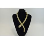 White Crystal Gilt Snake Necklace, an ar