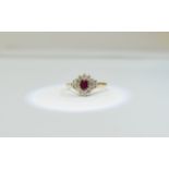 9ct Gold Diamond and Ruby Cluster, central ruby surrounded by round cut diamonds, fully hallmarked,
