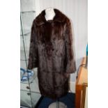 Mink Coat Good quality ladies long mink coat in russet brown with chocolate brown poly-satin lining.