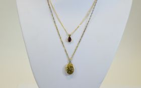 Two 9ct Gold Chains Together With A Yellow Metal Locket And Gem Set Pendant