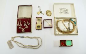 Small Collection of Costume Jewellery including faux pearls, hoop earrings, musical key ring,
