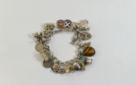 Silver Charm Bracelet WJS Heart padlock With Approx 20 Charms To Include Bagpipes,