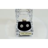 Pair of CZ Solitaire Stud Earrings in a faux crystal box