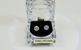 Pair of CZ Solitaire Stud Earrings in a faux crystal box