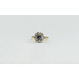 18ct Gold Sapphire And Diamond Ring Central Sapphire Surrounded By Five old Round Cut Diamonds,