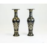 Pair of Persian Style Incised Metal Vases, the tall, narrow baluster bodies, flared to base and rim,