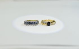 Two Silver Sapphire Set Rings.