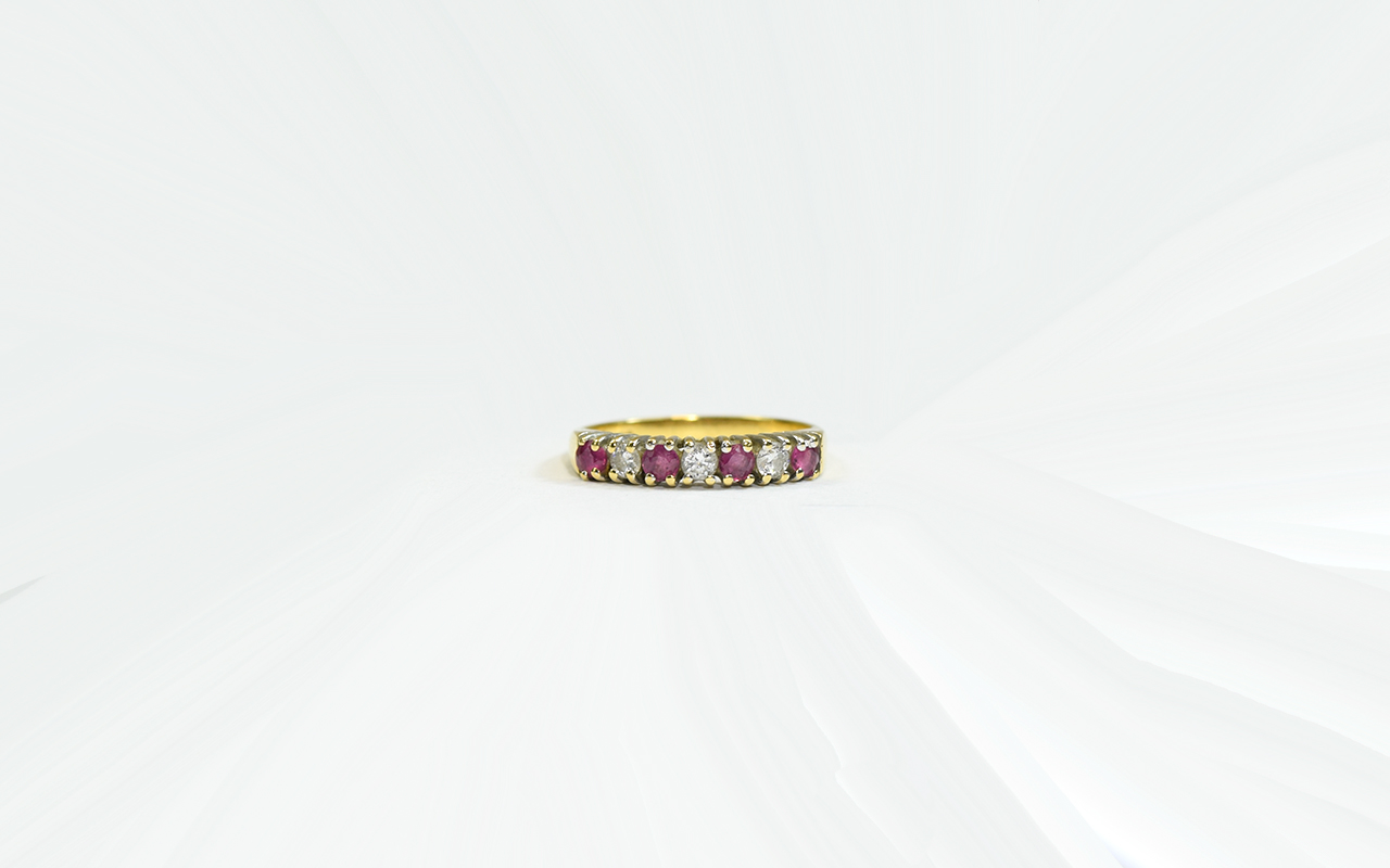 Ladies 18ct Yellow Gold Set Ruby and Diamond Channel Set Ring.