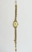 Omega - Ladies 9ct Gold Mechanical Wrist Watch with Attached 9ct Gold Diamond Cut Bracelet. Hallmark