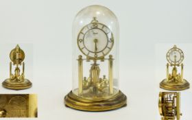 Prescot Carriage Clock, under dome, Arabic numerals and white dial. 13 inches in height.