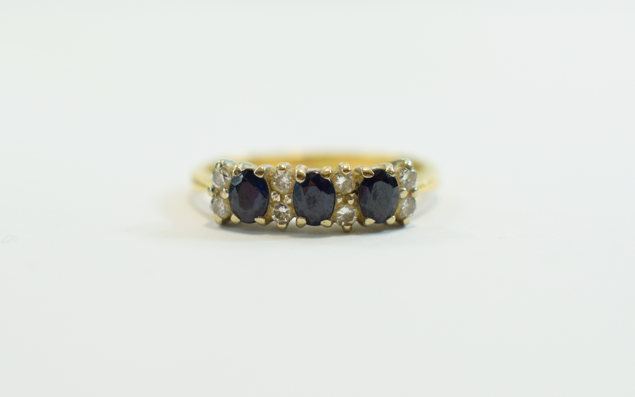 18ct Yellow Gold Set Sapphire and Diamond Ring.