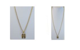 A 9ct Gold Pendant Drop with Diamond Inset to Centre, Attached to a Long 9ct Gold Chain.