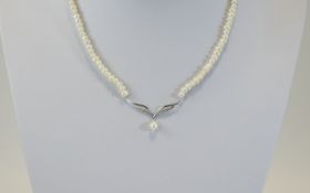 Cultured Pearl Necklace with 9ct & Diamond Pendant.