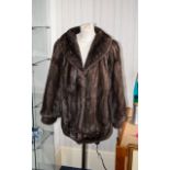 Mink Coat Silver grey ladies mink coat, short bomber/blouson style jacket with fitted cuffs.