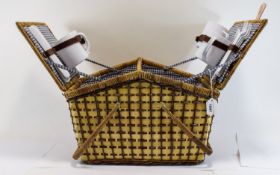 Modern Picnic Hamper complete with plates, cups and cutlery.