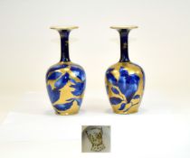 Pair of Forester Phoenix Ware Small Baluster Vases, decorated with deep flow blue flowers surrounded