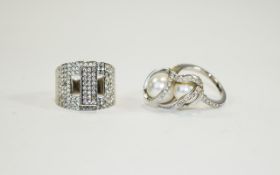 Swarovski Rings Two silver tone and crystal set rings.