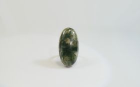 Large Silver Dress Ring set with a moss agate. Stamped 925.