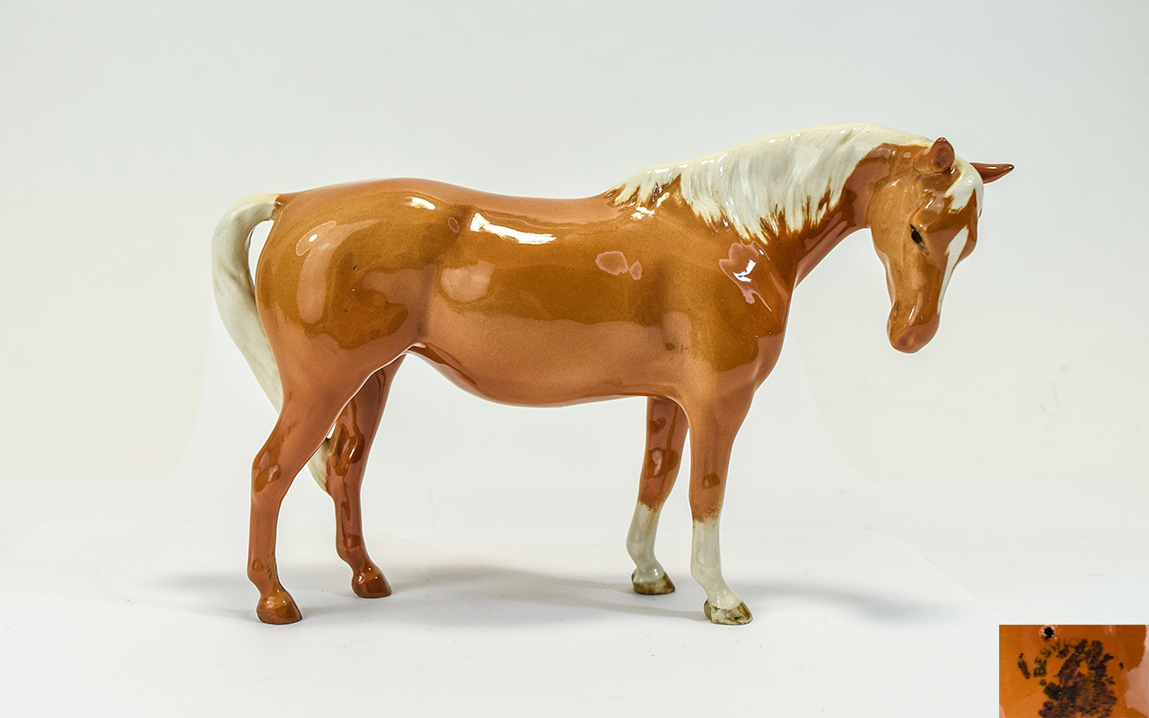 Beswick Horse Figure ' Mare 'Palomino - Head Down. Model 1812, Designer A. Gredington.