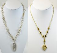 Swarovski Gold tone and Crystal Necklaces Two boxed necklaces, the first,