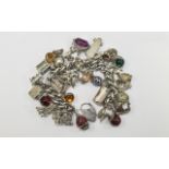 A Solid Silver and Heavy Curb Bracelet - Loaded with Over 33 Good Quality Vintage Charms.