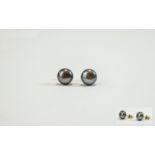 A Fine Pair of 9ct Gold Set Cultured Black Pearl Earrings. Fully Hallmarked For 9ct Gold.