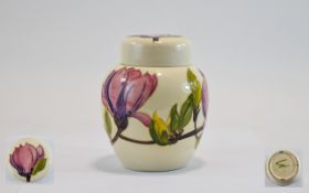 Moorcroft - Tube lined Globular Shaped Lidded Ginger Jar ' Magnolia ' Pattern on Cream Ground.