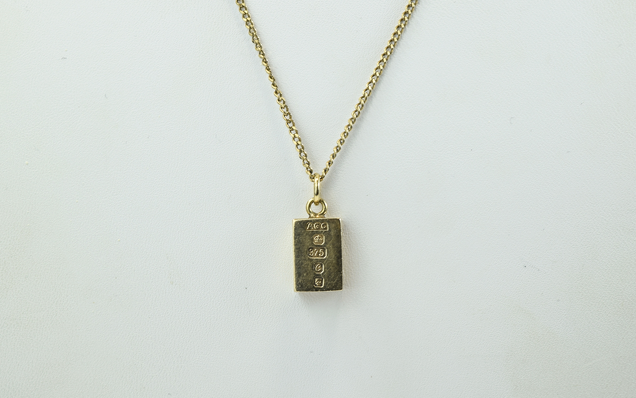 Queen Elizabeth II Small 9ct Gold Ingot Attached to a 9ct Gold Curb Chain.