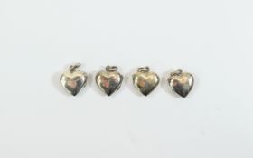 4 Silver Heart Shaped Lockets.