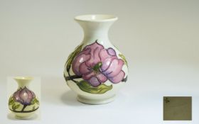 Moorcroft - Tube lined Globular Shaped Vase. Magnolia Design on Cream Ground. c.1970's. 5.25