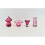 Four Pieces of Cranberry Glass. Includes small vase, basket vase, frilled edged vanity pot.