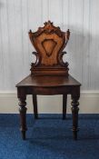 19thC Mahogany Hall Chair carved shield shaped back rest, turned legs,