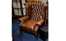 Leather Chesterfield Wingback Armchair.