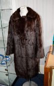 Mink Coat Good quality ladies long mink coat in russet brown with chocolate brown poly-satin lining.