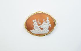 Antique 15ct Gold Oval Shaped Framed Cameo, Depicting a Classical Scene with Safety Chain.