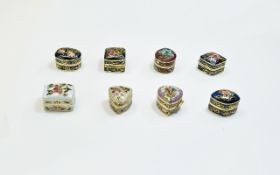 A Boxed Vintage Collection of 8 Small Enamel on Metal Hinged Lidded Pill Boxes of Various Shapes,