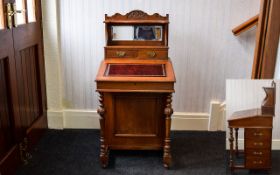 Victorian Walnut Davenport with a Raised Upper Section with a leather lined writing slope and a