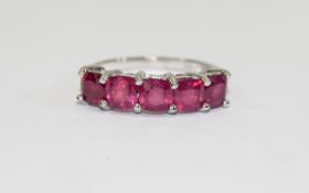 Ruby Five Stone Band Ring, comprising five cushion cut rubies of equal size and good colour,