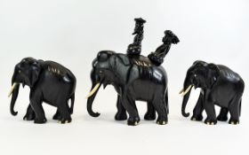 Antique - Well Made and Heavy Trio of Ebony Elephant Tusks and Feet. c.1900.