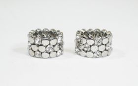 Two Designer DKNY Silver Rings.