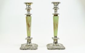 A Mid 20th Century Pair of Silver Plated and Onyx Candlesticks In The Georgian Style.