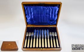Edwardian Boxed Set of 12 Piece Fish Knives and Forks with Silver Blades and Bone Handles.