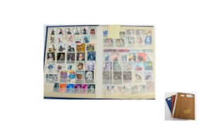 Three Old Stamp Stock Books filled with stamps form all over the world but particularly USA, GB,