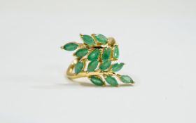 Emerald Leaf and Branch Ring, 14 marquise cut emeralds, totalling 3.