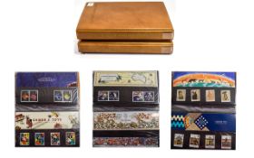Two Albums of Modern Presentation Stamps approximately 120 packs, some definitive high value.
