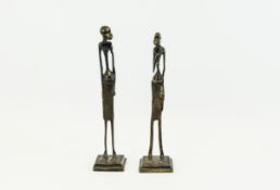 A Vintage Pair of American Studio Art Bronze Elongated Figures. Each 12 Inches High.