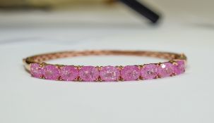 Pink Crackled Quartz Bangle, over 10cts of oval cut, bright pink quartz,