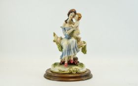 Capodimonte Style Hand Painted Figure Group - Mother and Child, Raised on an Oval Shaped Wooden